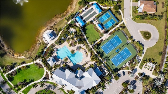 birds eye view of property featuring a water view