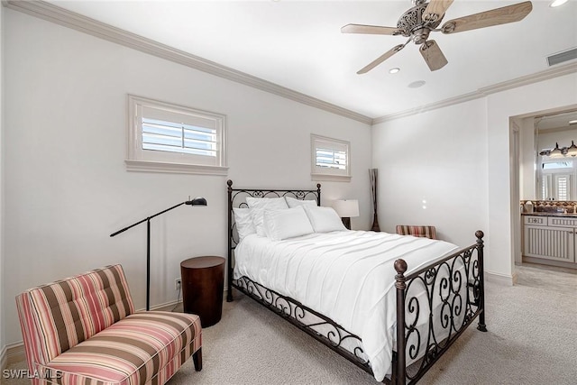 carpeted bedroom with multiple windows, ceiling fan, and crown molding