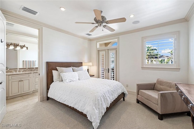 bedroom featuring ceiling fan, sink, crown molding, and light carpet