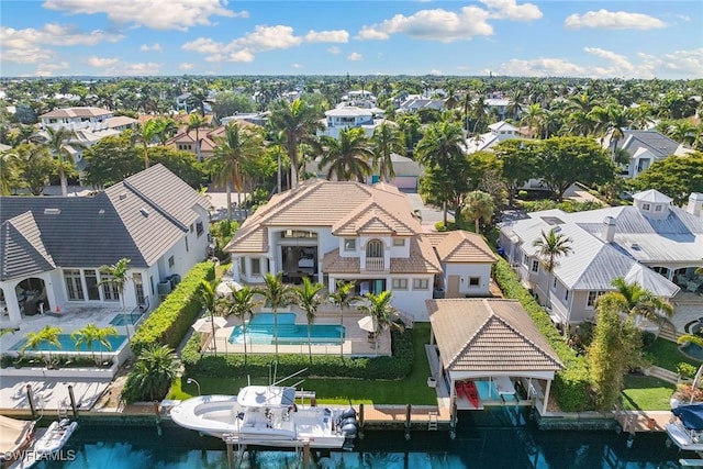 bird's eye view with a water view