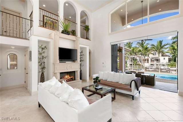 living room with a towering ceiling