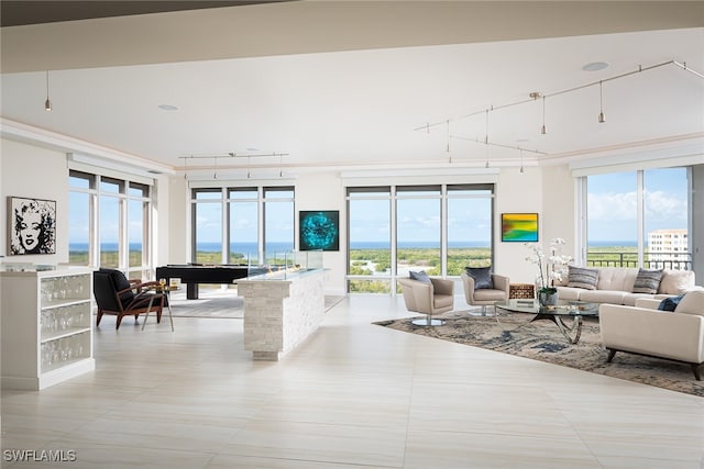 living room featuring light tile patterned floors, rail lighting, and billiards