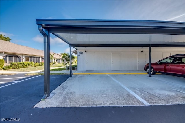 view of car parking featuring a carport