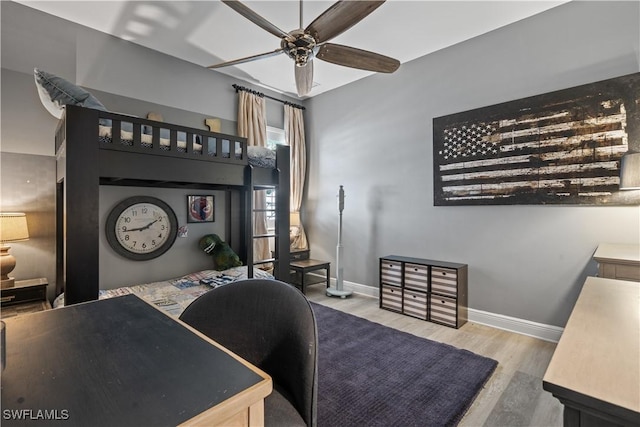 bedroom featuring ceiling fan and light wood-type flooring