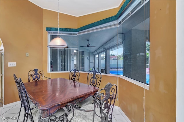 tiled dining room with ceiling fan