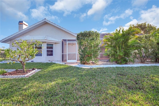 view of front of house with a front lawn