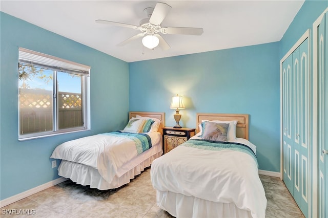 bedroom featuring ceiling fan and a closet