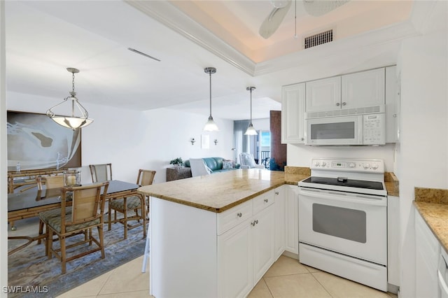 kitchen featuring kitchen peninsula, white appliances, light tile patterned floors, white cabinets, and hanging light fixtures