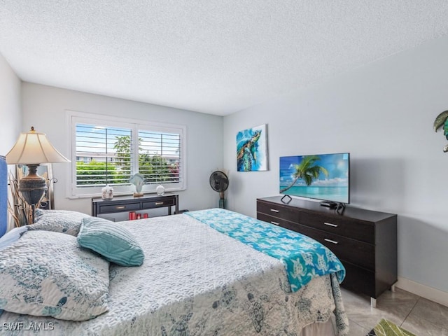 bedroom featuring a textured ceiling