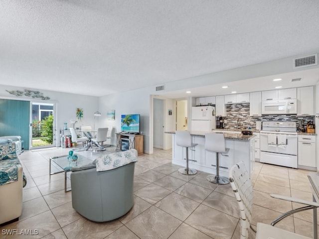 living room featuring sink