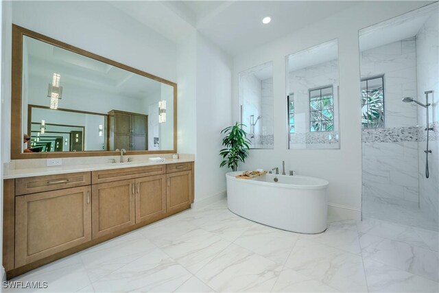 bathroom with marble finish floor, a soaking tub, vanity, and a marble finish shower