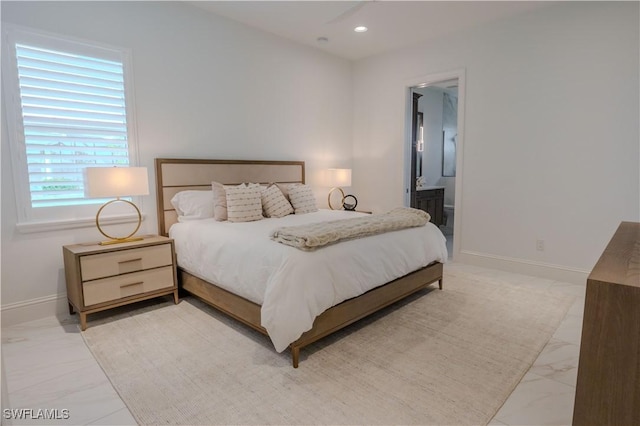 bedroom featuring recessed lighting, marble finish floor, connected bathroom, and baseboards