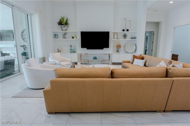 living area featuring marble finish floor, built in shelves, and recessed lighting