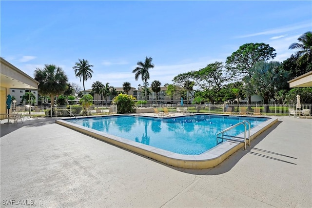 view of pool featuring a patio