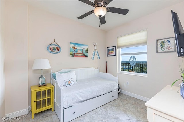 bedroom featuring ceiling fan