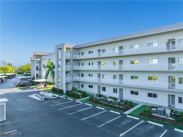 view of building exterior with cooling unit