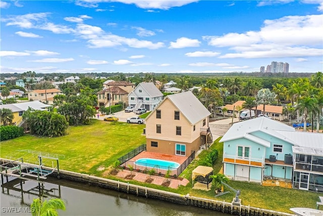 drone / aerial view featuring a water view