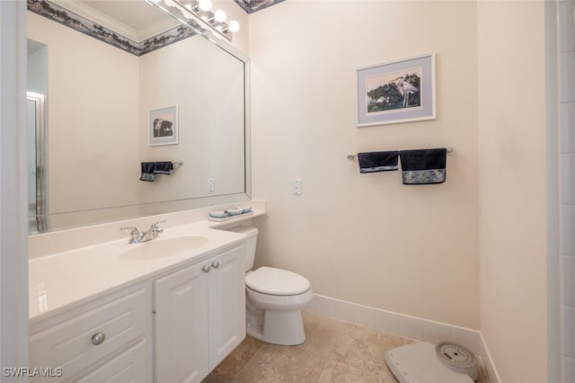 bathroom with crown molding, tile patterned flooring, vanity, and toilet