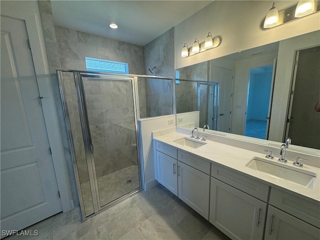 bathroom with vanity and walk in shower