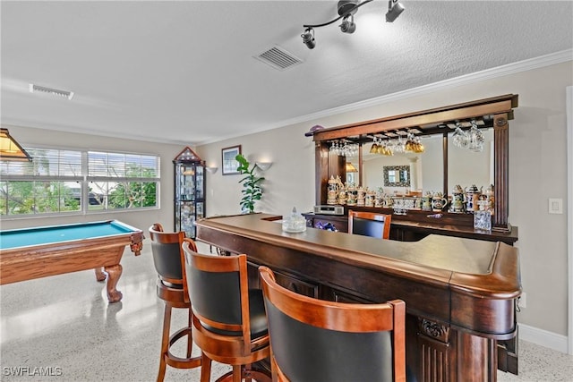 bar featuring crown molding, a textured ceiling, and pool table