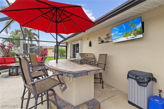 view of patio / terrace featuring area for grilling, an outdoor bar, and a lanai