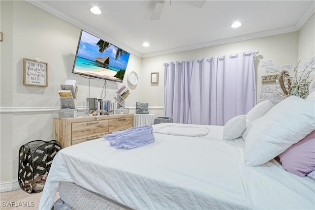 carpeted bedroom featuring ceiling fan and crown molding