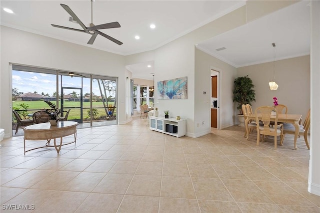 tiled living room featuring ceiling fan and crown molding