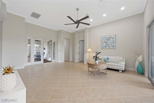 living room with french doors, light tile patterned floors, ceiling fan, and crown molding