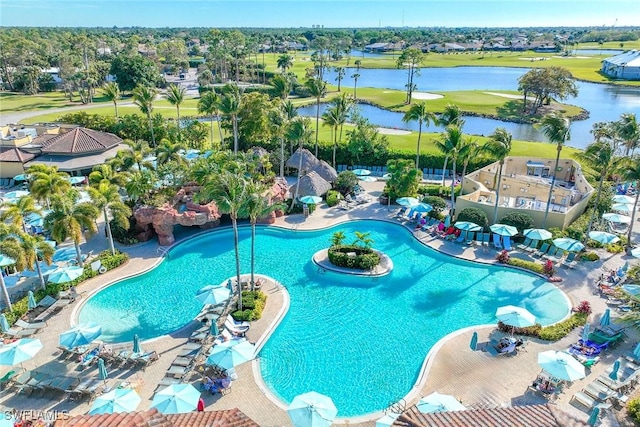 view of pool with a water view