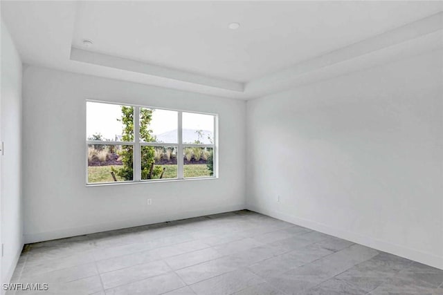 44402 Panther Dr, Punta Gorda, FL 33982 - unfurnished room featuring a tray ceiling