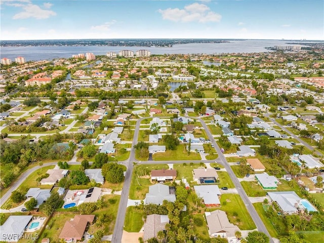 bird's eye view with a water view