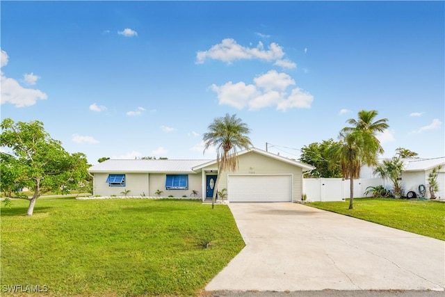 ranch-style home featuring a front yard and a garage