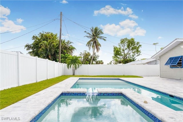 view of swimming pool with an in ground hot tub