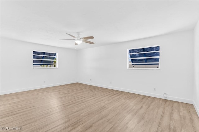 unfurnished room featuring ceiling fan and light hardwood / wood-style flooring