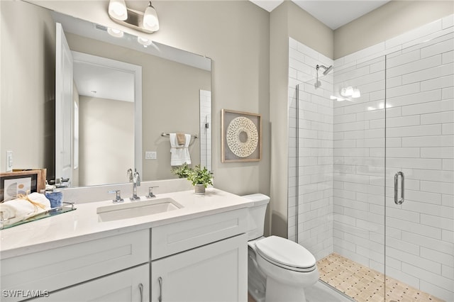 full bath with a stall shower, visible vents, toilet, and vanity