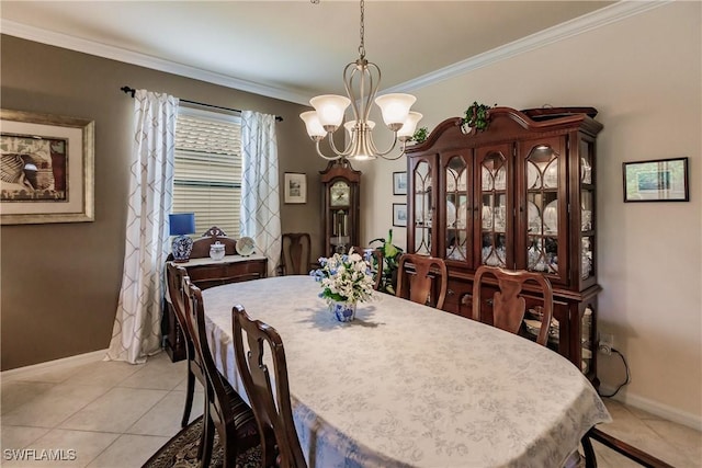 dining area featuring light tile patterned flooring, ornamental molding, and a chandelier