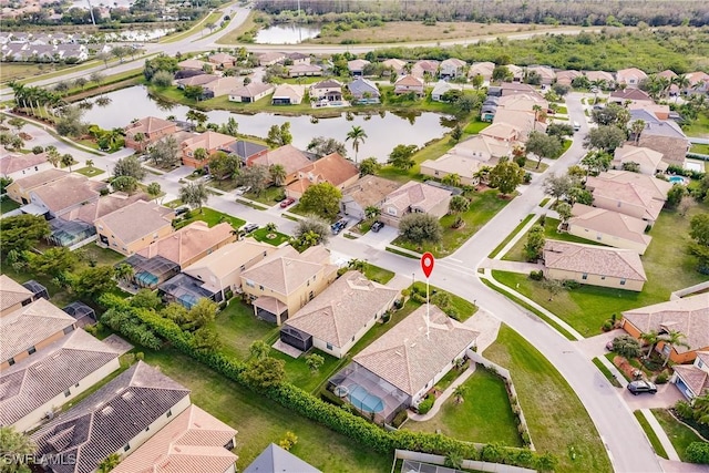 drone / aerial view with a water view