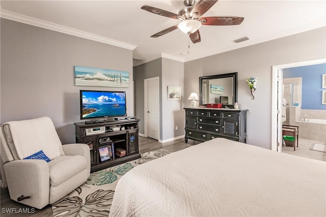 bedroom with hardwood / wood-style flooring, ceiling fan, crown molding, and ensuite bath