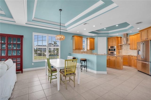 7532 Lake Valencia Ct Unit 5B, Fort Myers Beach, FL 33931 - dining space with a healthy amount of sunlight, a tray ceiling, a chandelier, and crown molding