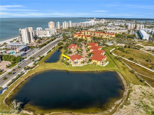 7532 Lake Valencia Ct Unit 5B, Fort Myers Beach, FL 33931 - drone / aerial view featuring a water view and a city view