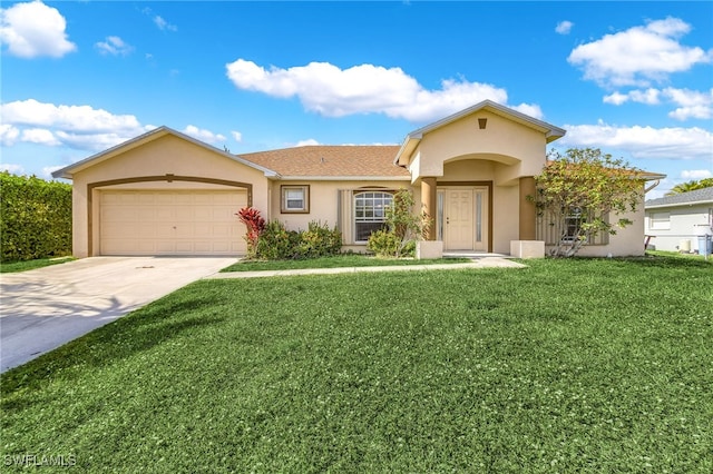 view of front of home featuring a garage and a front yard