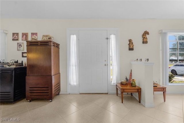 view of tiled foyer entrance