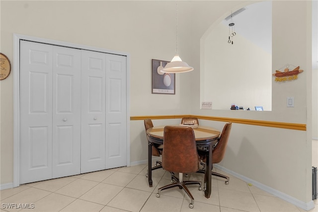 dining space with light tile patterned floors