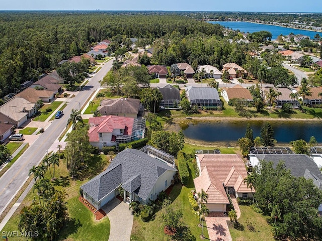 drone / aerial view with a water view