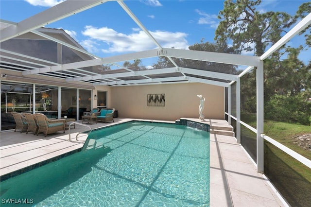 view of pool with an outdoor living space, a lanai, and a patio