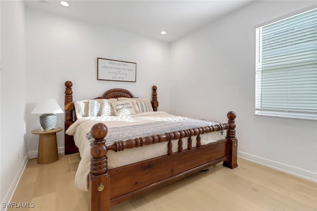 bedroom featuring light hardwood / wood-style floors