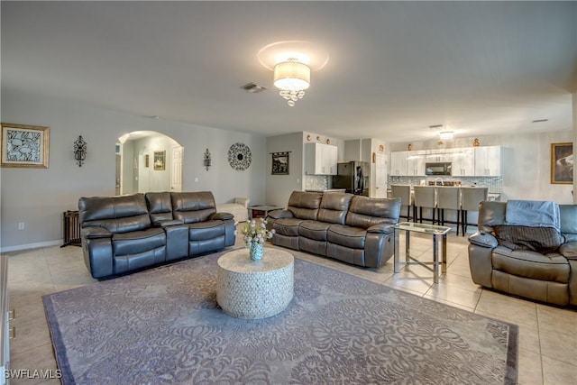 living room featuring light tile patterned floors