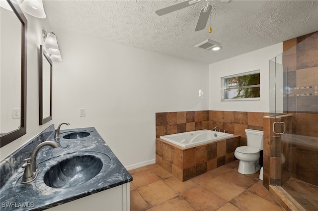 full bathroom with vanity, toilet, a textured ceiling, and plus walk in shower