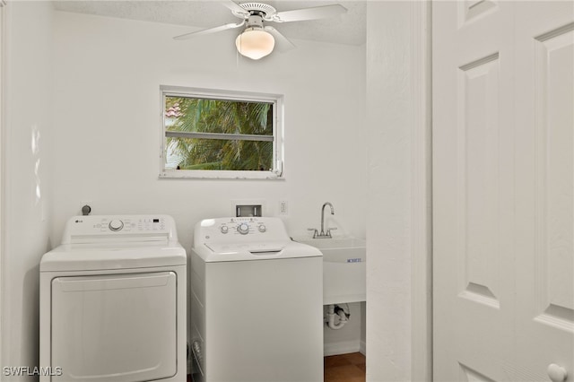 laundry area with washer and dryer and ceiling fan