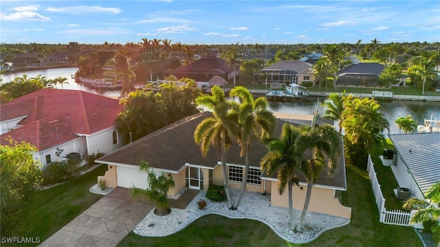 drone / aerial view with a water view